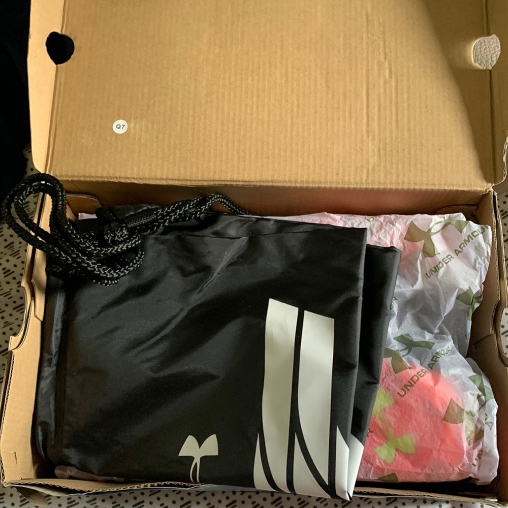 Under Armour athletic shoes.